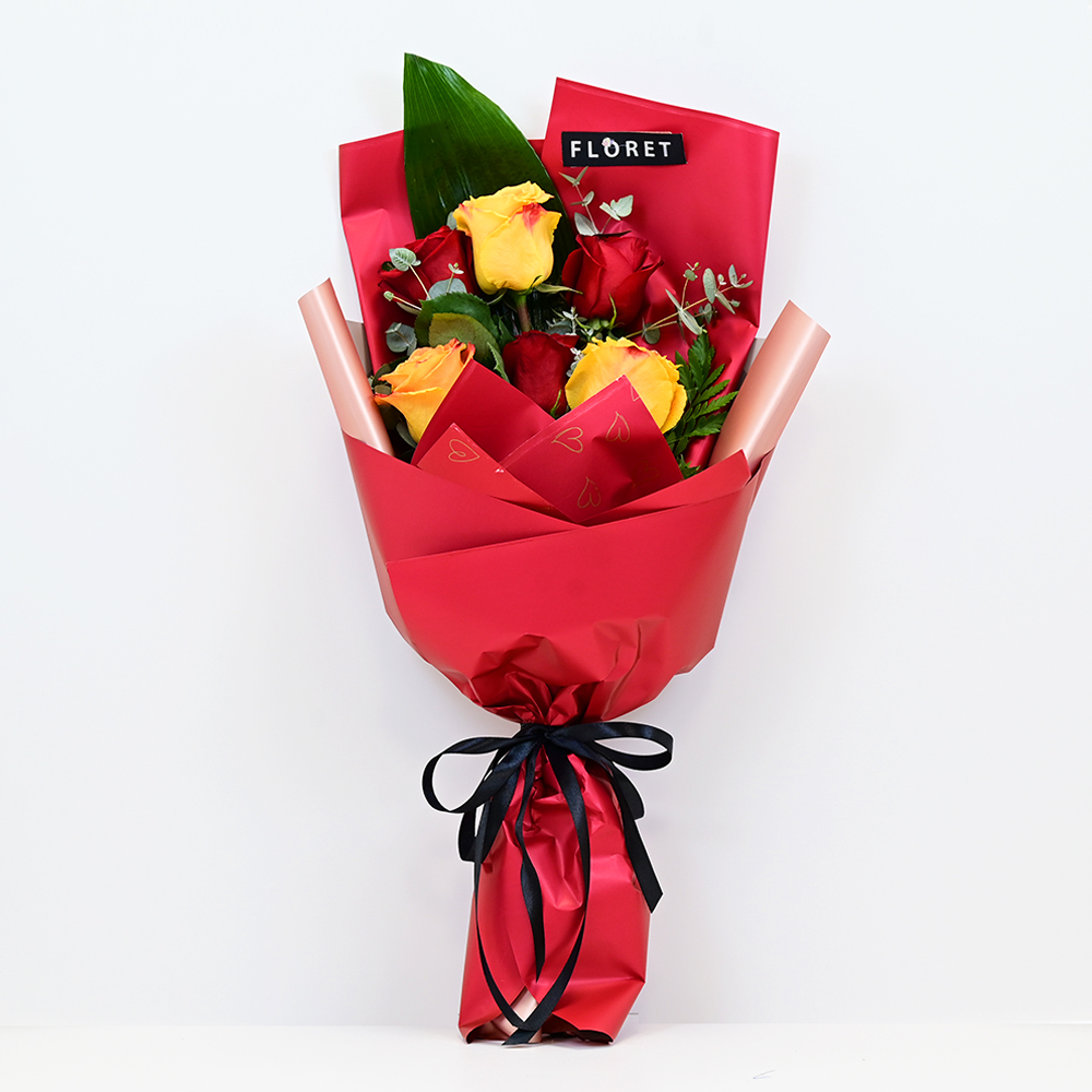 xl_media_image3 ورد أحمر واصفر ملغف بتغليف جميل باللون الأحمر Yellow and red flowers wrapped in the beauty of red